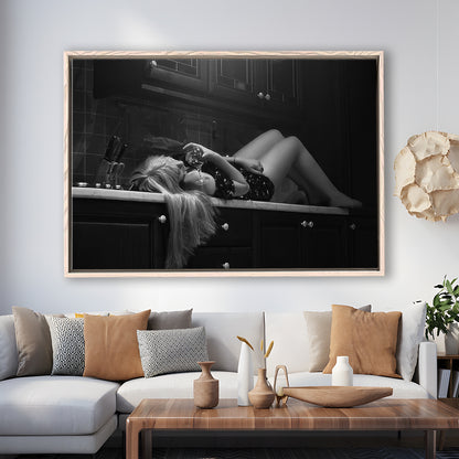 Woman Laying On Kitchen Counter Holding Wine Glass Framed Canvas Print Wall Art, Drunk Woman Black and White Wall Decor