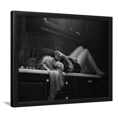 Woman Laying On Kitchen Counter Holding Wine Glass Framed Art Print Wall Decor, Drunk Woman Black and White Wall Decor