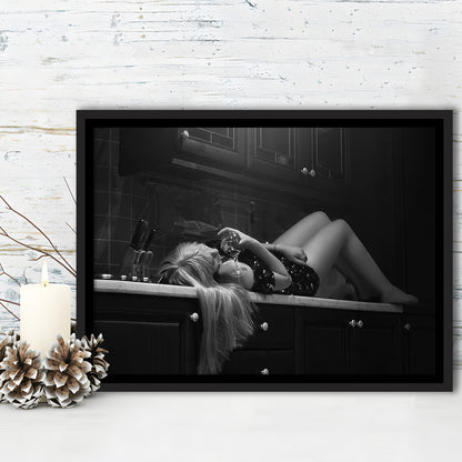 Woman Laying On Kitchen Counter Holding Wine Glass Framed Canvas Print Wall Art, Drunk Woman Black and White Wall Decor