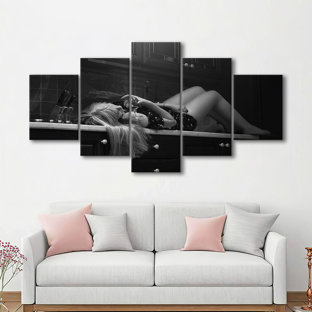 Woman Laying On Kitchen Counter Holding Wine Glass Mixed Canvas Print Wall Art, Drunk Woman Black and White Wall Decor