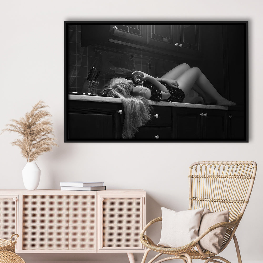 Woman Laying On Kitchen Counter Holding Wine Glass Framed Canvas Print Wall Art, Drunk Woman Black and White Wall Decor