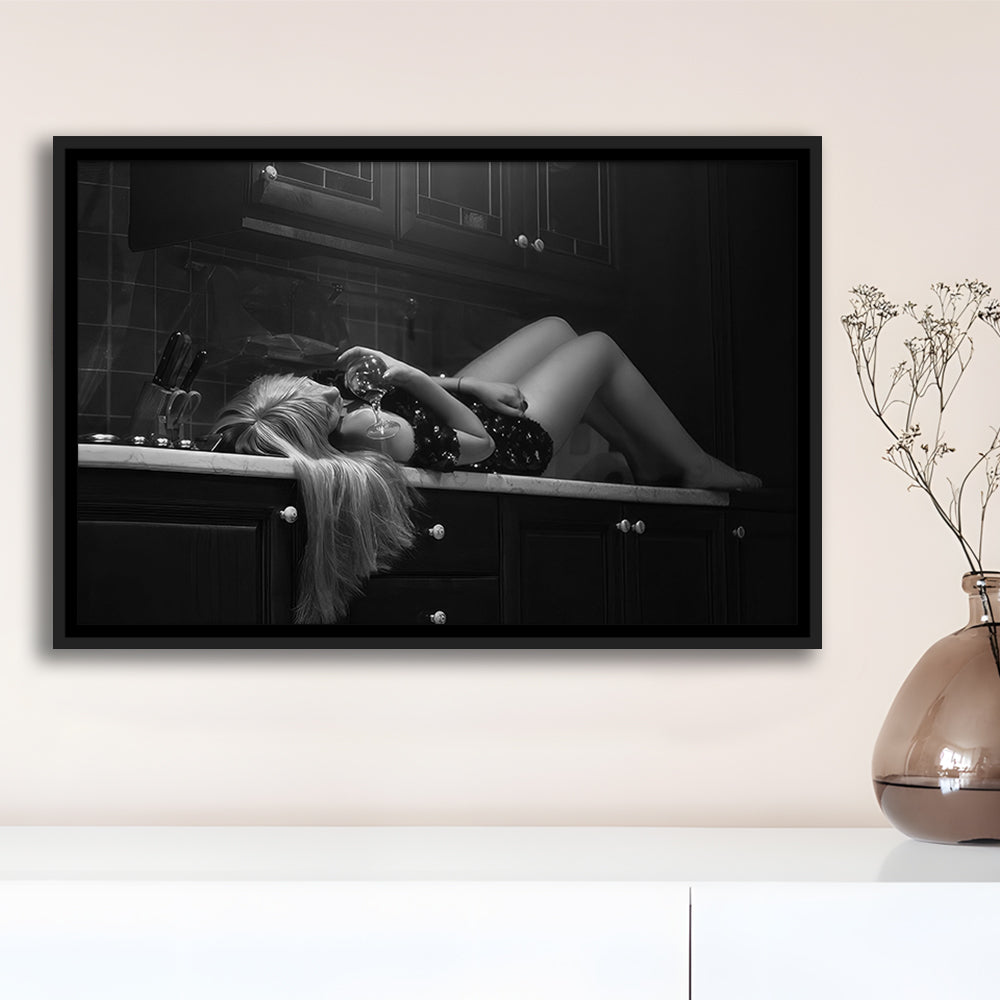 Woman Laying On Kitchen Counter Holding Wine Glass Framed Canvas Print Wall Art, Drunk Woman Black and White Wall Decor