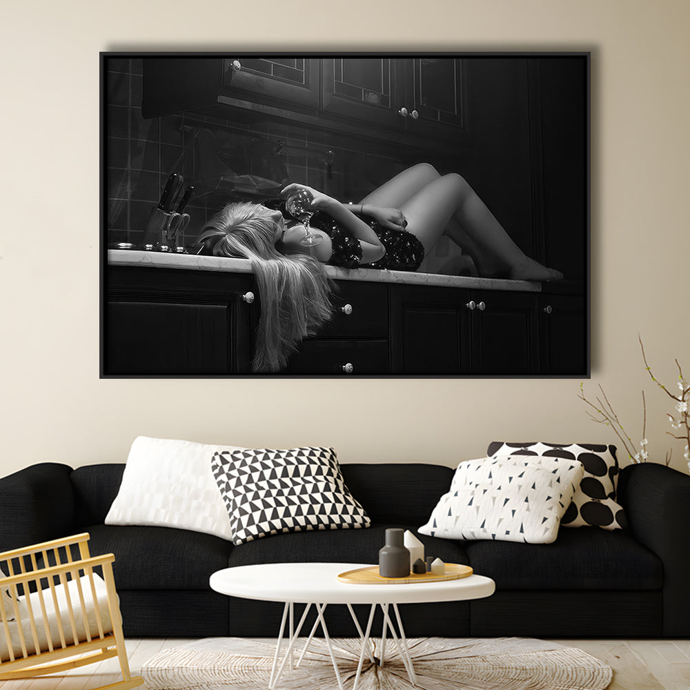 Woman Laying On Kitchen Counter Holding Wine Glass Framed Canvas Print Wall Art, Drunk Woman Black and White Wall Decor
