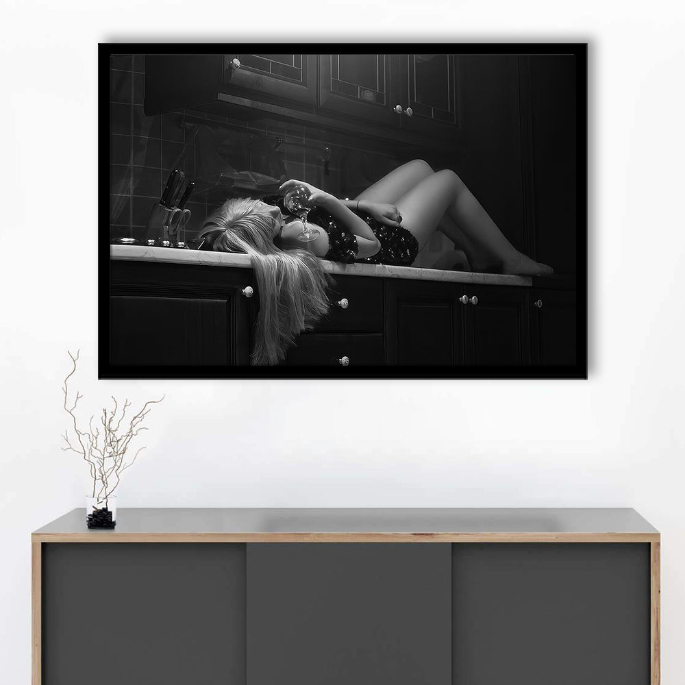 Woman Laying On Kitchen Counter Holding Wine Glass Framed Art Print Wall Decor, Drunk Woman Black and White Wall Decor