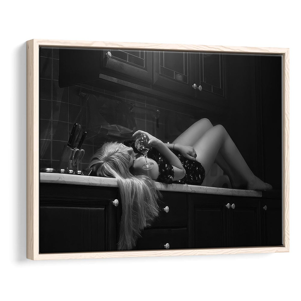 Woman Laying On Kitchen Counter Holding Wine Glass Framed Canvas Print Wall Art, Drunk Woman Black and White Wall Decor