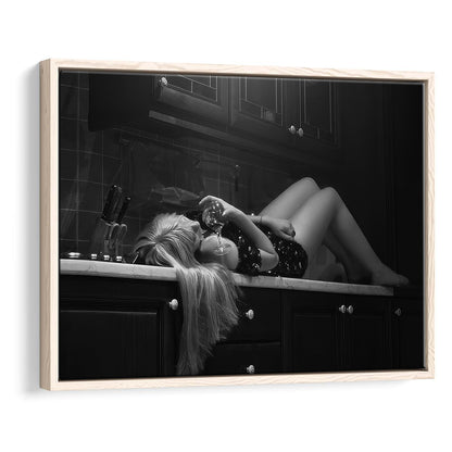 Woman Laying On Kitchen Counter Holding Wine Glass Framed Canvas Print Wall Art, Drunk Woman Black and White Wall Decor